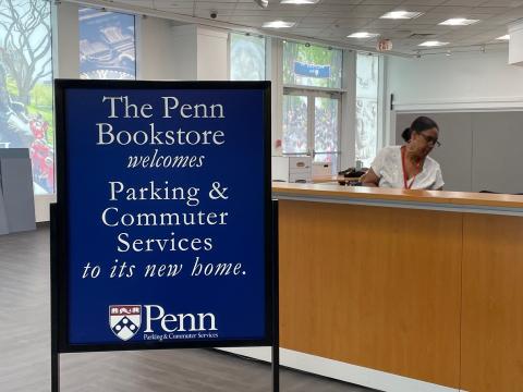 Sign welcoming Parking & Commuter Services to the Penn Bookstore